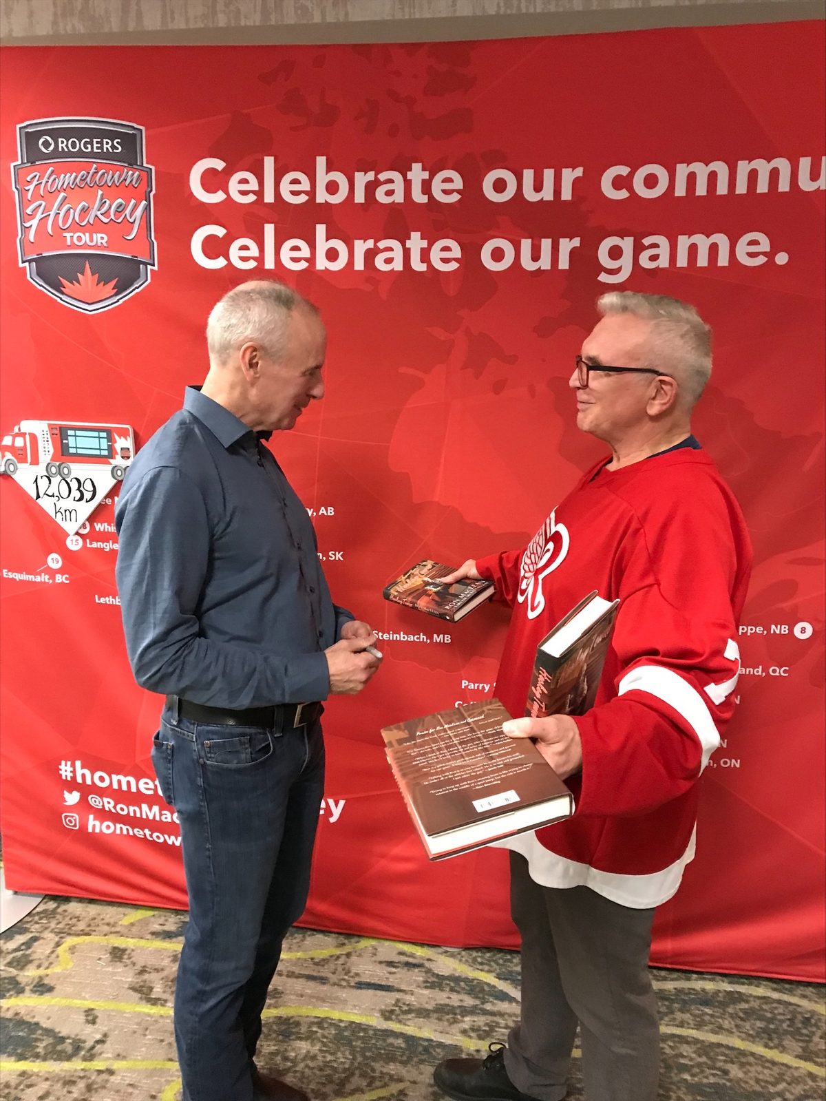 Paul Albrecht in a red hockey jersey at a Hometown Hockey event in Langley